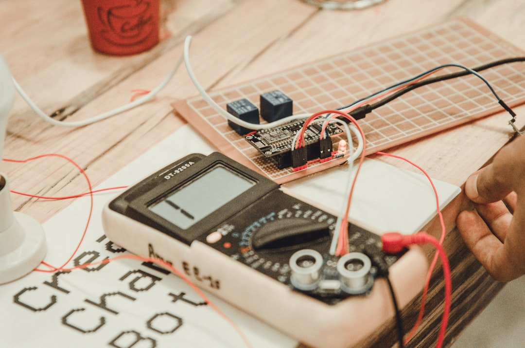 person-uses-white-multimeter-ctmuaoo-jji